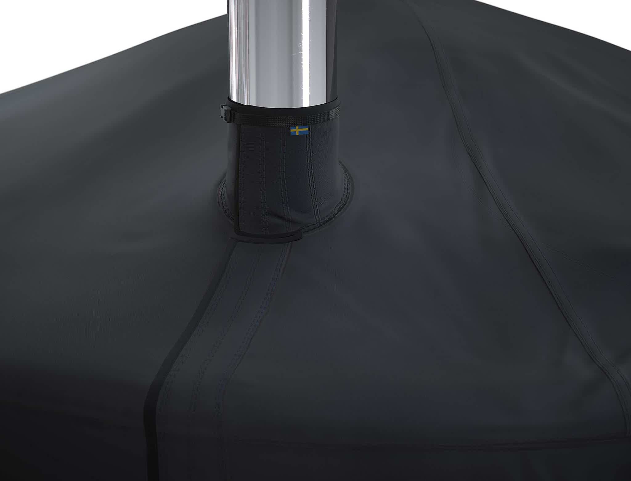 Black canvas cover for Skargards hot tub with silver pole.